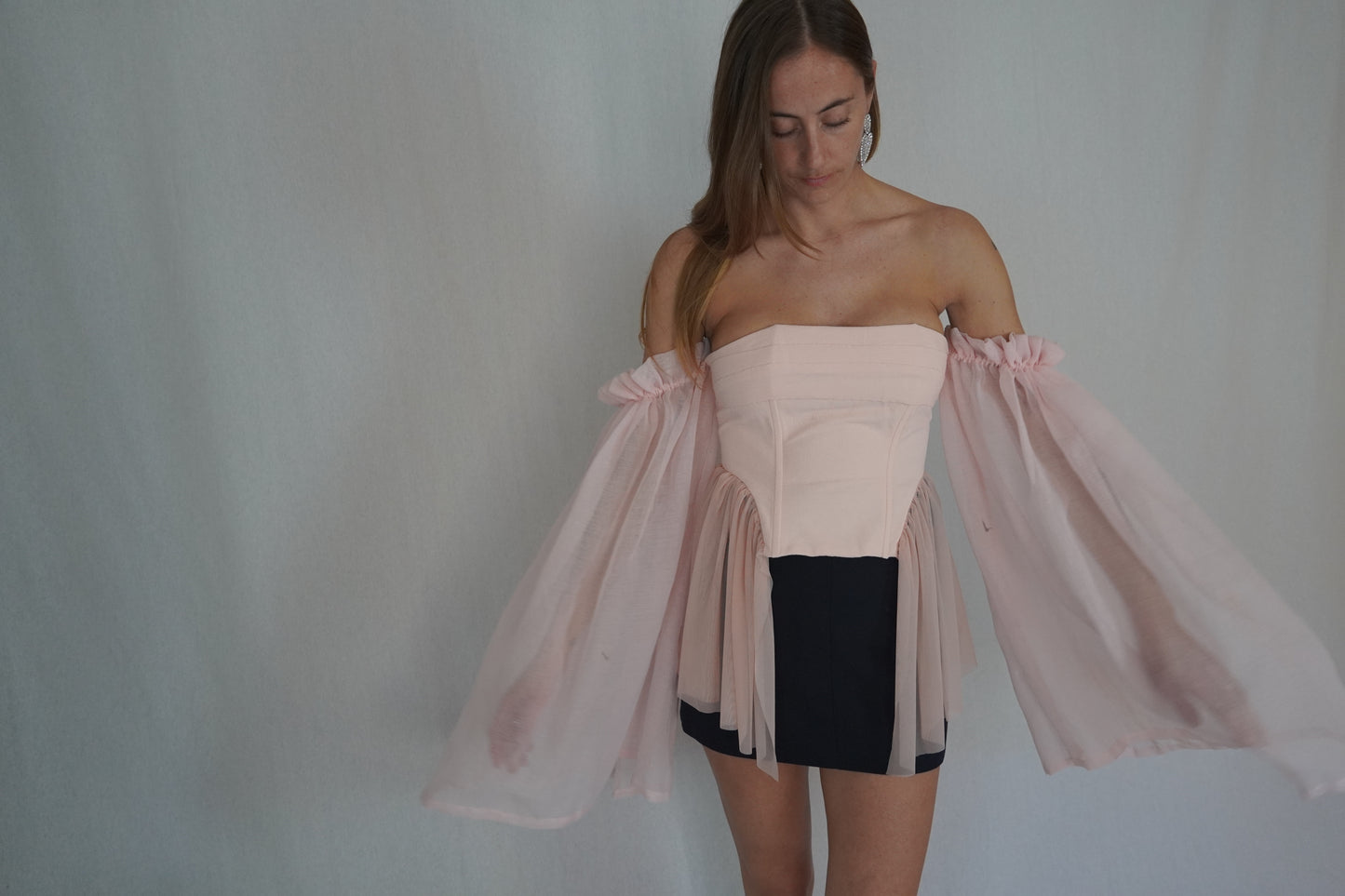 Pink corset with ruffle sleeves