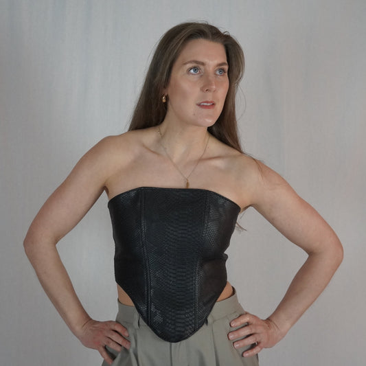 Leather corset with red lining